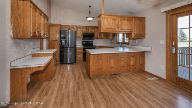 449 13TH ST E, DICKINSON, ND 58601, photo 5 of 27