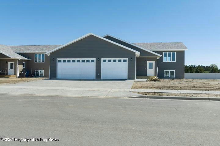 3209 LYONS AVE, DICKINSON, ND 58601, photo 1 of 18