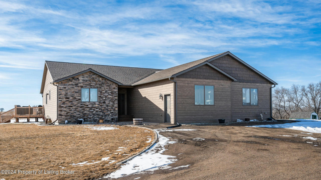 4143 111J AVE SW, DICKINSON, ND 58601, photo 1 of 60