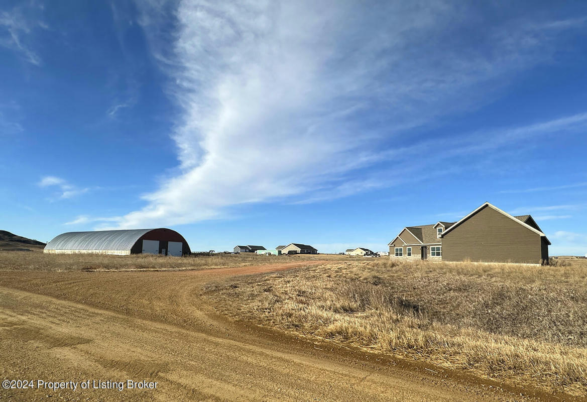 3015 107TH AVE SW, DICKINSON, ND 58601, photo 1 of 37
